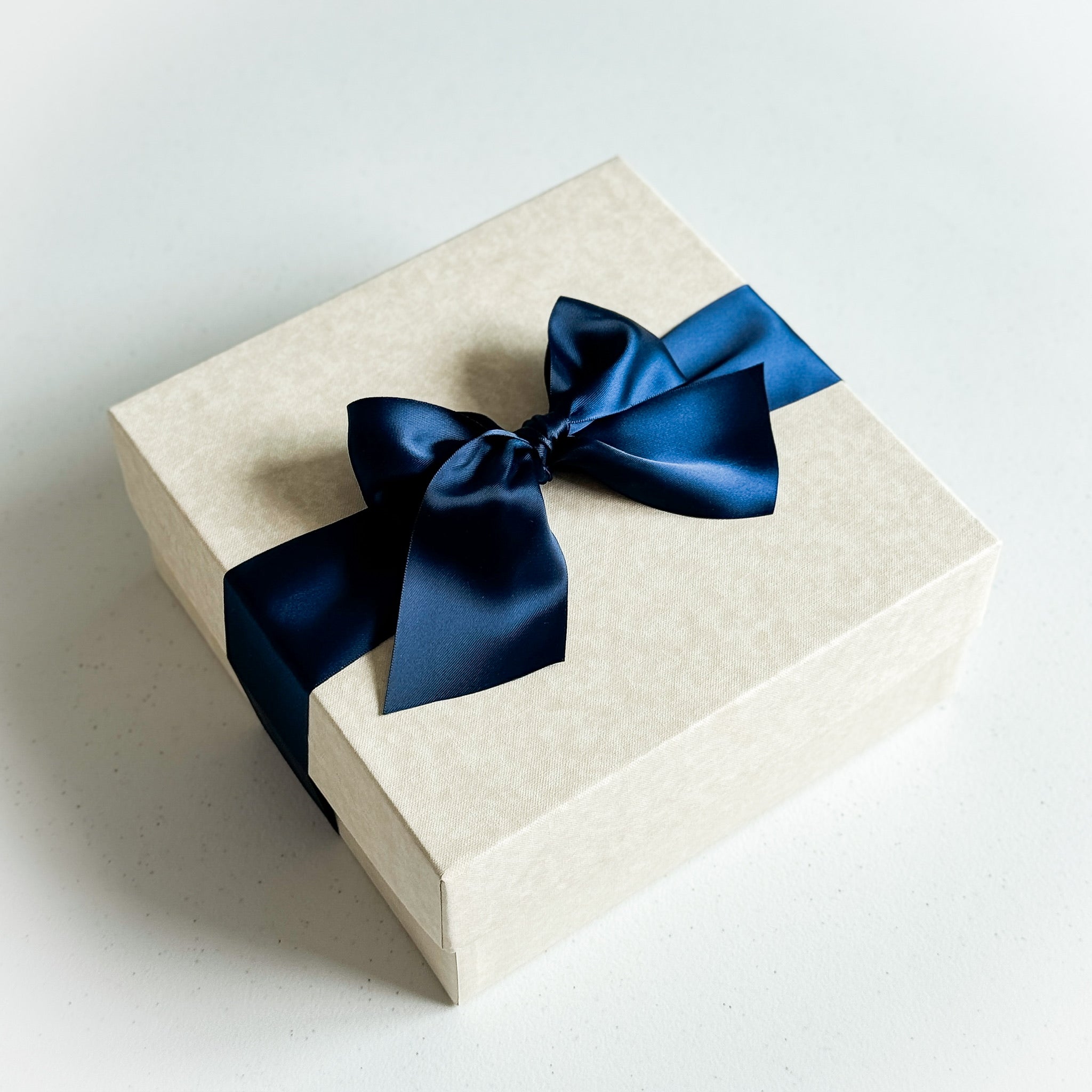 Satin Ribbon (in a complementary color)