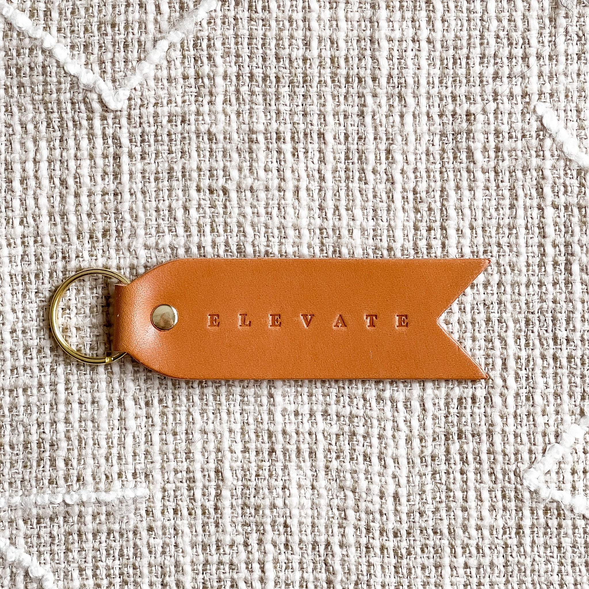 'ELEVATE' Camel Leather Keychain by Twin Sparrow